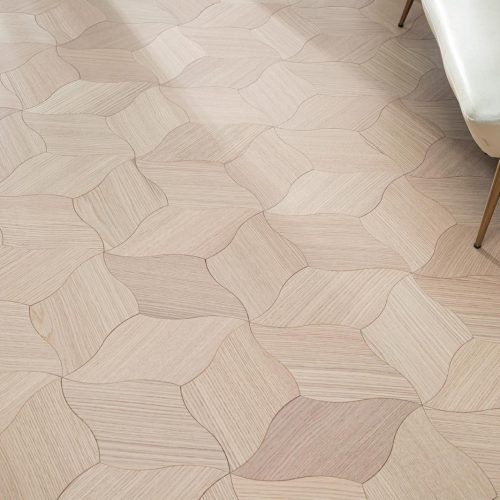 Close-up of White Oak Polycube Floorboard with light wood finish and polycube design