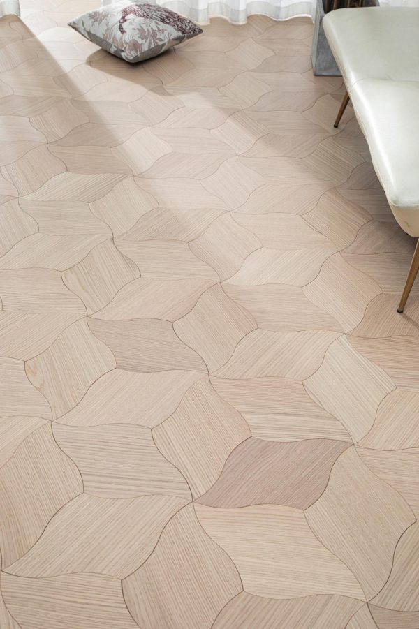 Close-up of White Oak Polycube Floorboard with light wood finish and polycube design