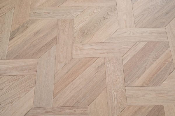 Overhead view of White Oak Luxe flooring, showcasing the geometric pattern.