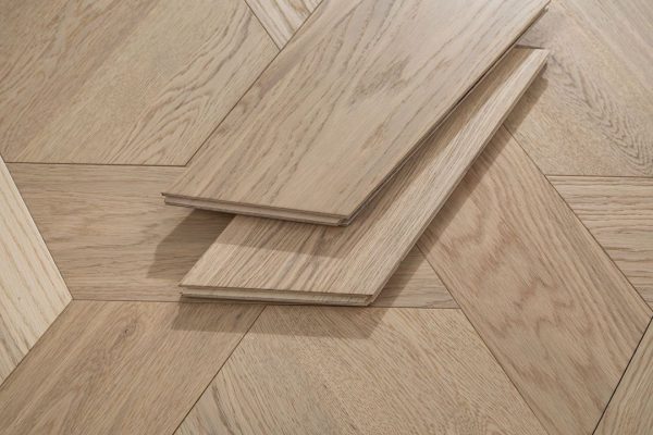 Close-up of Honey Comb Luxe hexagonal oak floorboards with individual planks displayed.