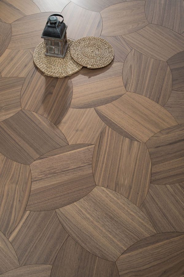 Close-up of luxury white oak floorboards with a herringbone pattern, enhancing modern Australian interiors.