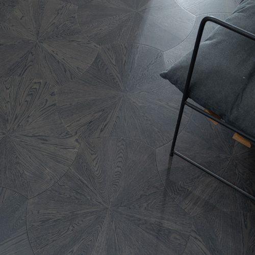 Obsidian Oak Lilypad floorboards showcasing a dark, natural lily pad pattern.