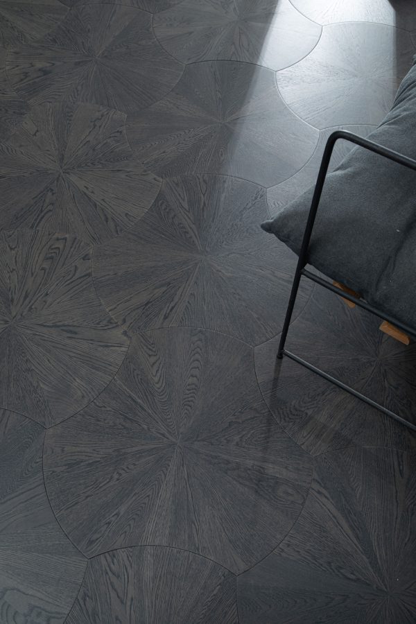 Obsidian Oak Lilypad floorboards showcasing a dark, natural lily pad pattern.