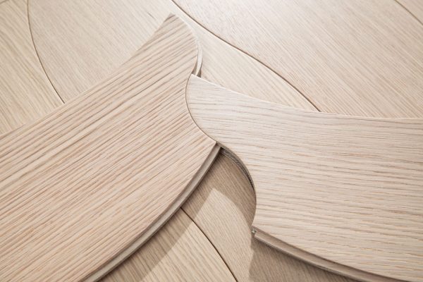 Close-up of White Oak Fluid Herringbone luxury floorboard joint, showcasing premium craftsmanship for Australian interiors.