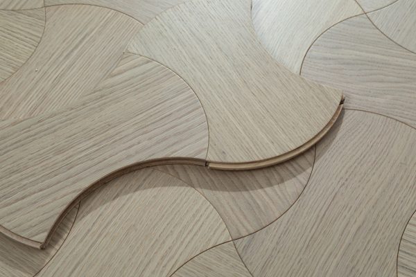 European Oak Dogbone Floorboard piece showing interlocking design.