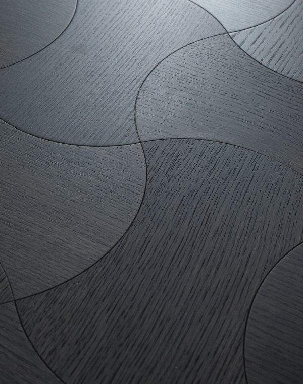 Detailed view of Obsidian Oak Dogbone floorboards with dark-stained oak finish, highlighting the unique dogbone design.