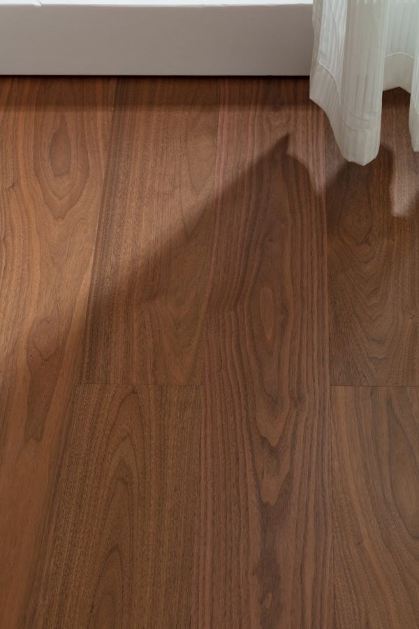 American Black Walnut Floorboard showcasing rich, dark hues and grain patterns.