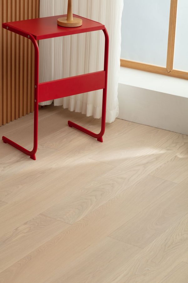 Close-up of Vanilla Oak floorboard showcasing its light, natural wood grain and smooth finish.