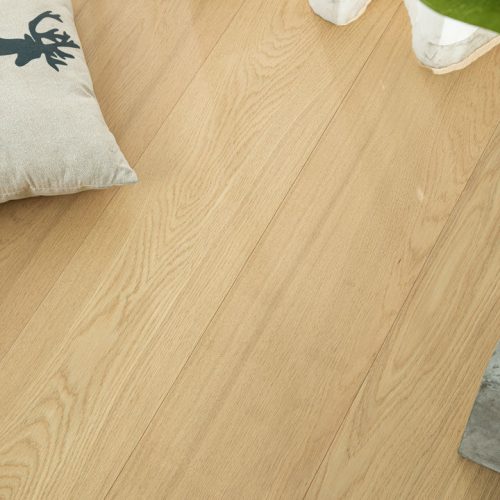 Close-up view of European Honey Oak floorboards showcasing natural grain and warm tones.