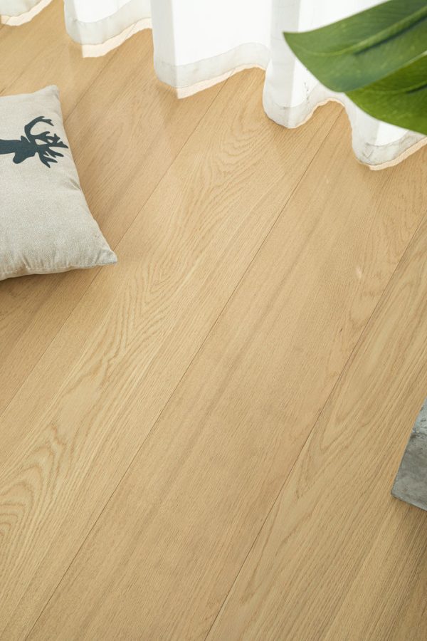 Close-up view of European Honey Oak floorboards showcasing natural grain and warm tones.