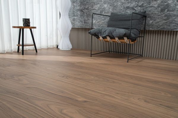 Room with QH9907 Walnut Floorboards, decorated with modern furniture.