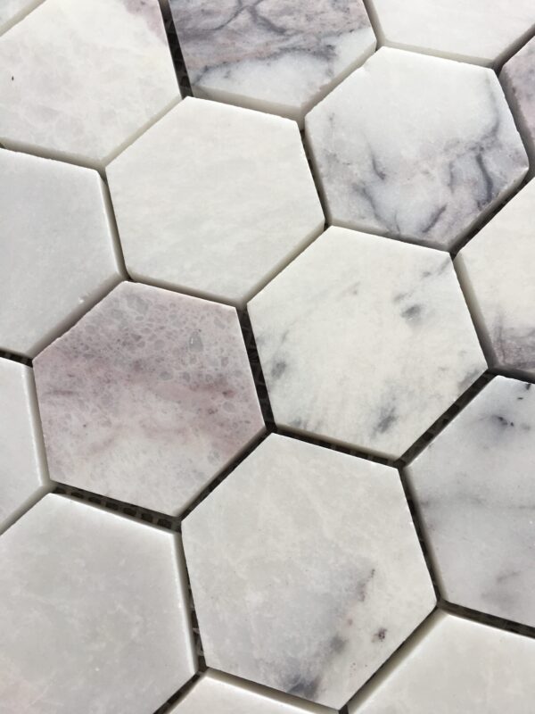 Snow Plum Hexagon Mosaic Tile – Polished black and white marble hexagonal tile with bold veining.